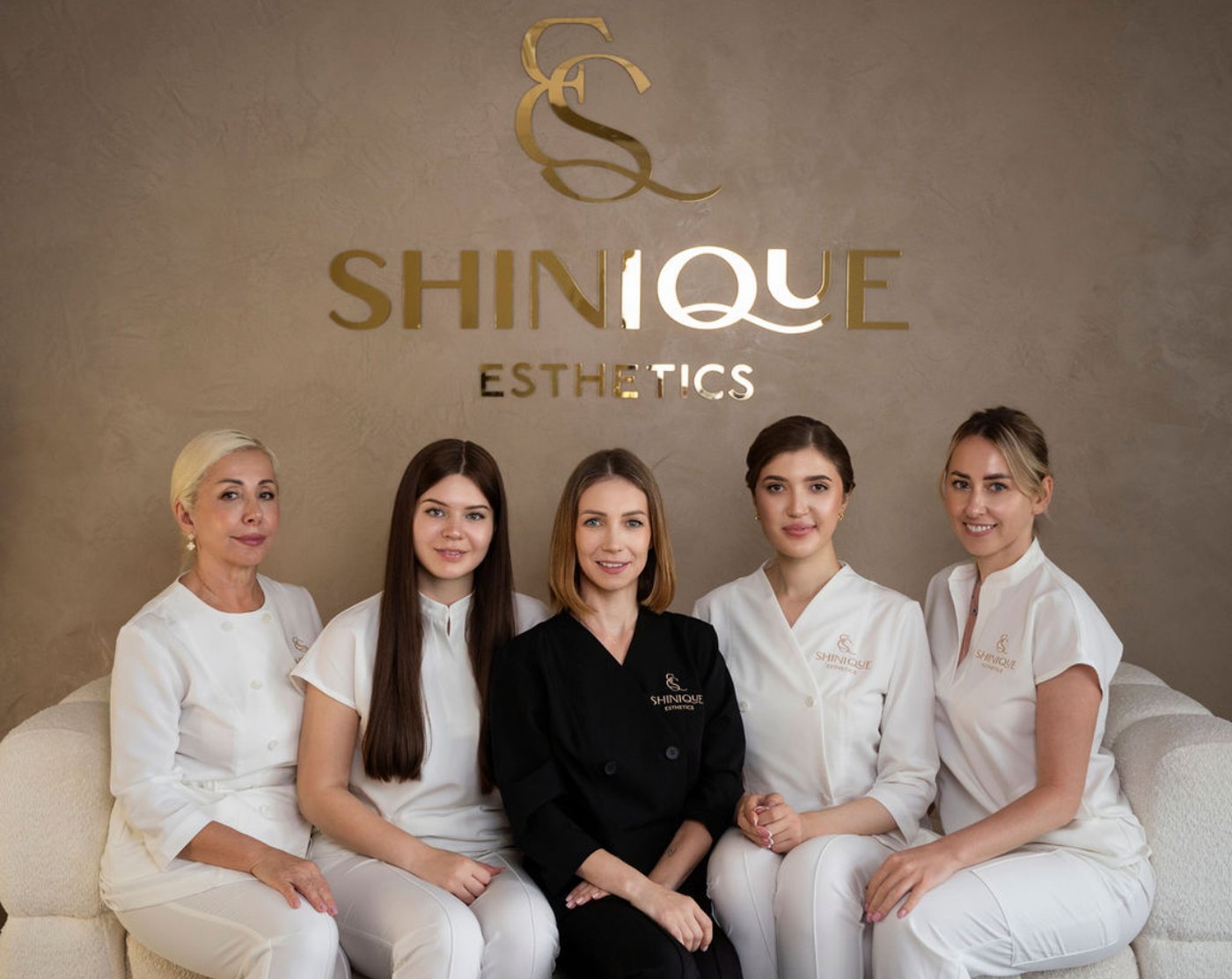 The Shinique Esthetics Med Spa team with founder Viktoriia Boiko in Bellevue, Washington